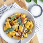 Butternut Squash gnocchi in a bowl on a cutting board