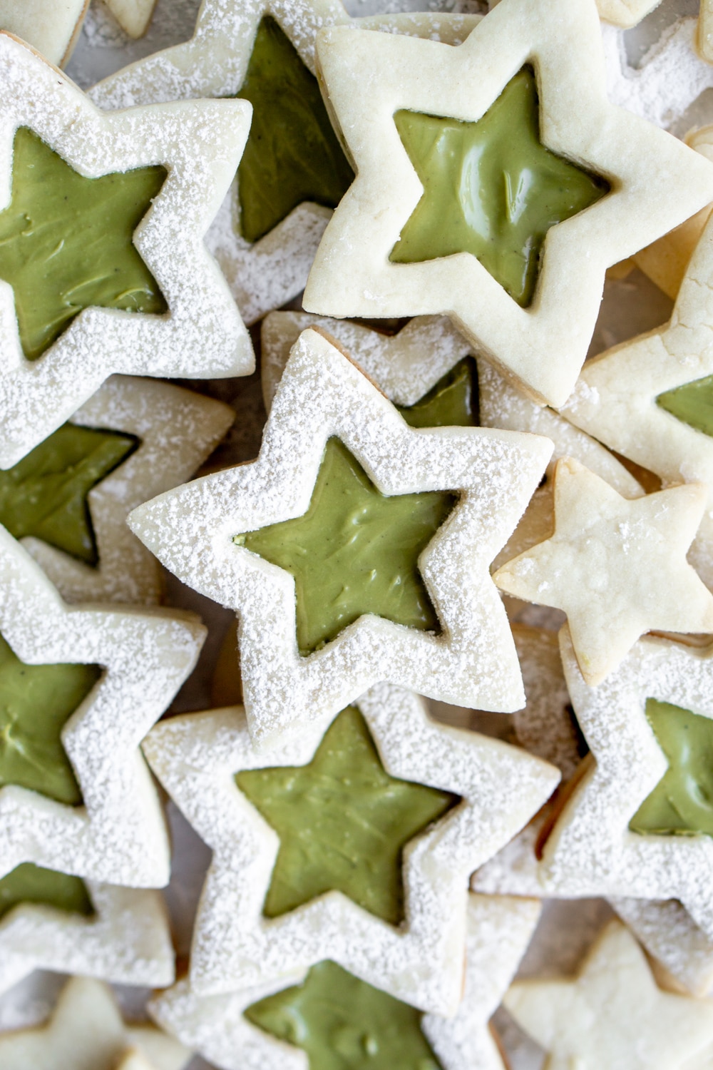 Stacked star cookies with green pistachio cream