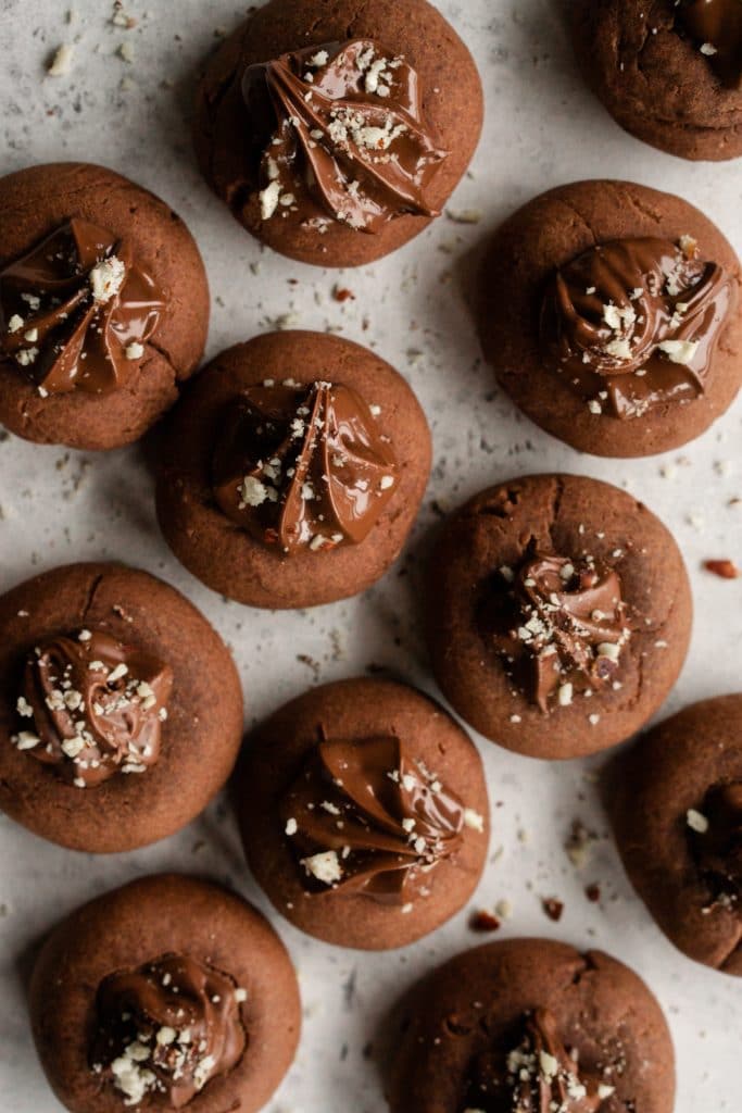 Cluster of 3-Ingredient nutella cookies on a grey surface
