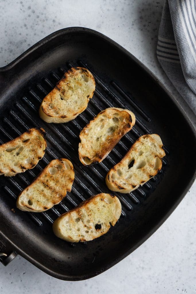 Grilled crostini in a grill pan