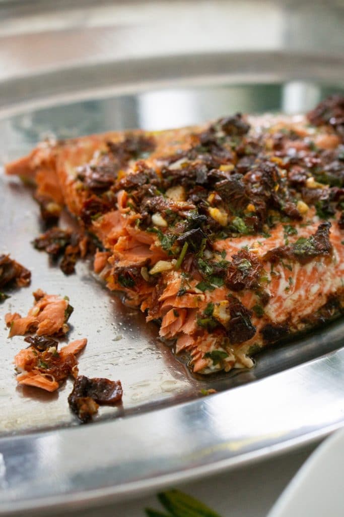 Sun dried tomato salmon filet cut in half