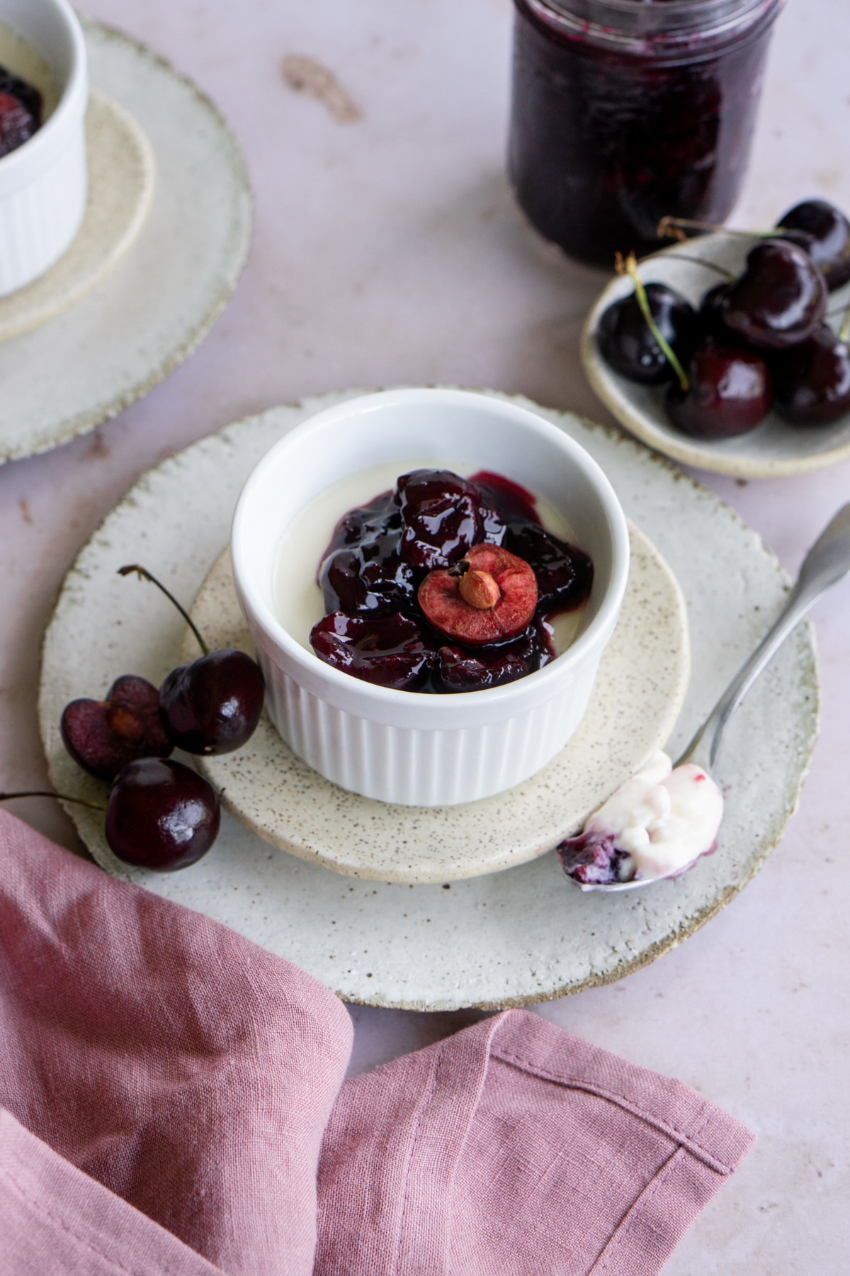 Ramekin of Italian panna cotta with cherry sauce