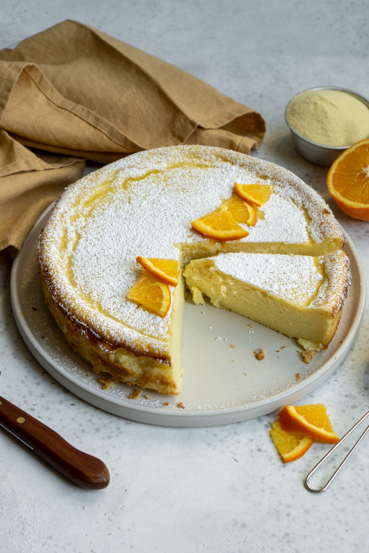 Migliaccio Italian semolina and ricotta cake in a plate with a napkin in the background