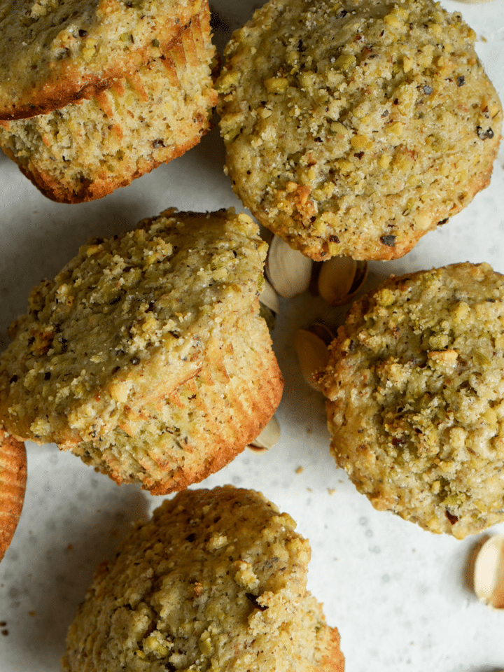 Pistachio muffins topped with pistachio crumble