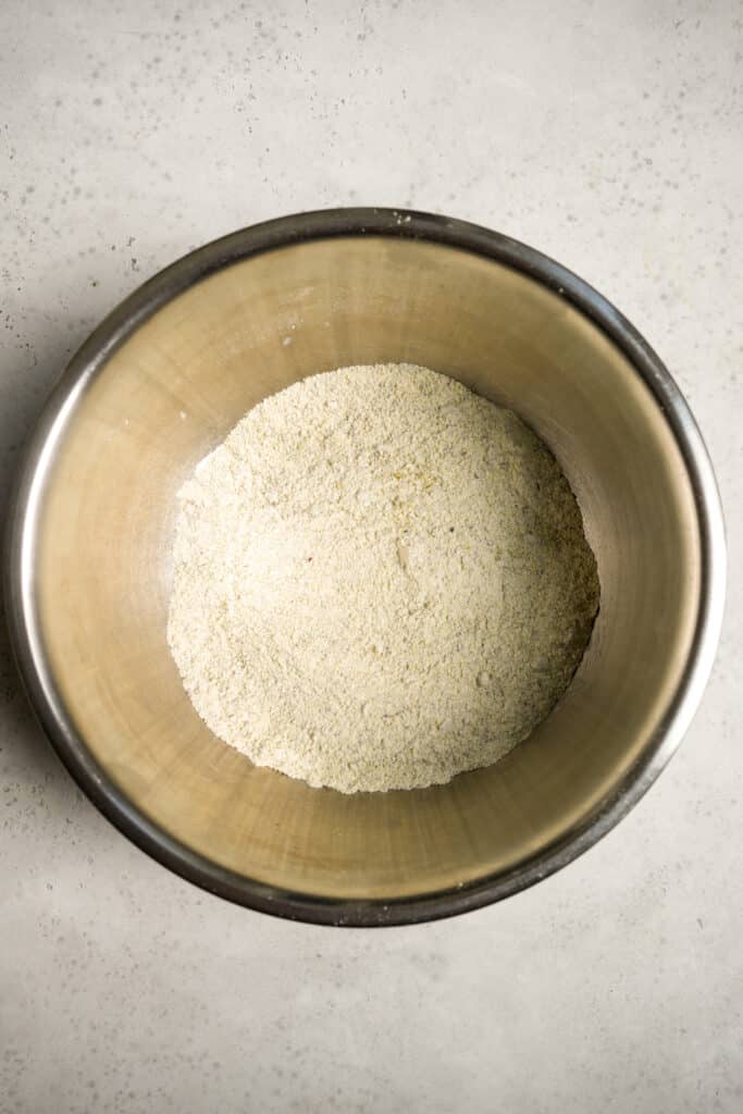 Pistachio muffins dry ingredients in a stainless steel bowl