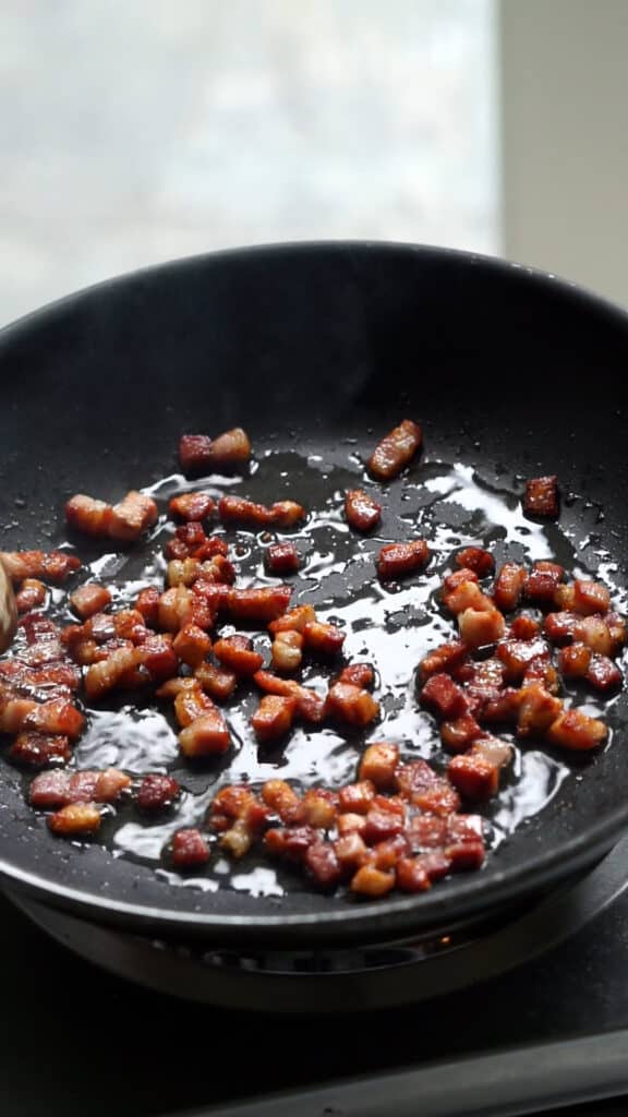 crispy pancetta in a pan