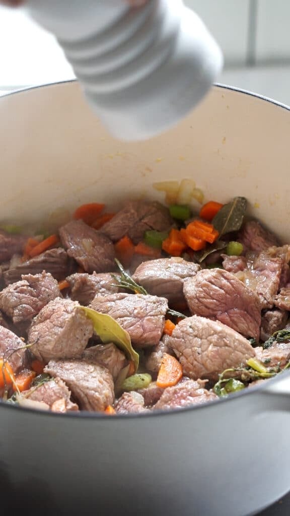 Italian beef stew process photo 3- browned cubes of beef in pot