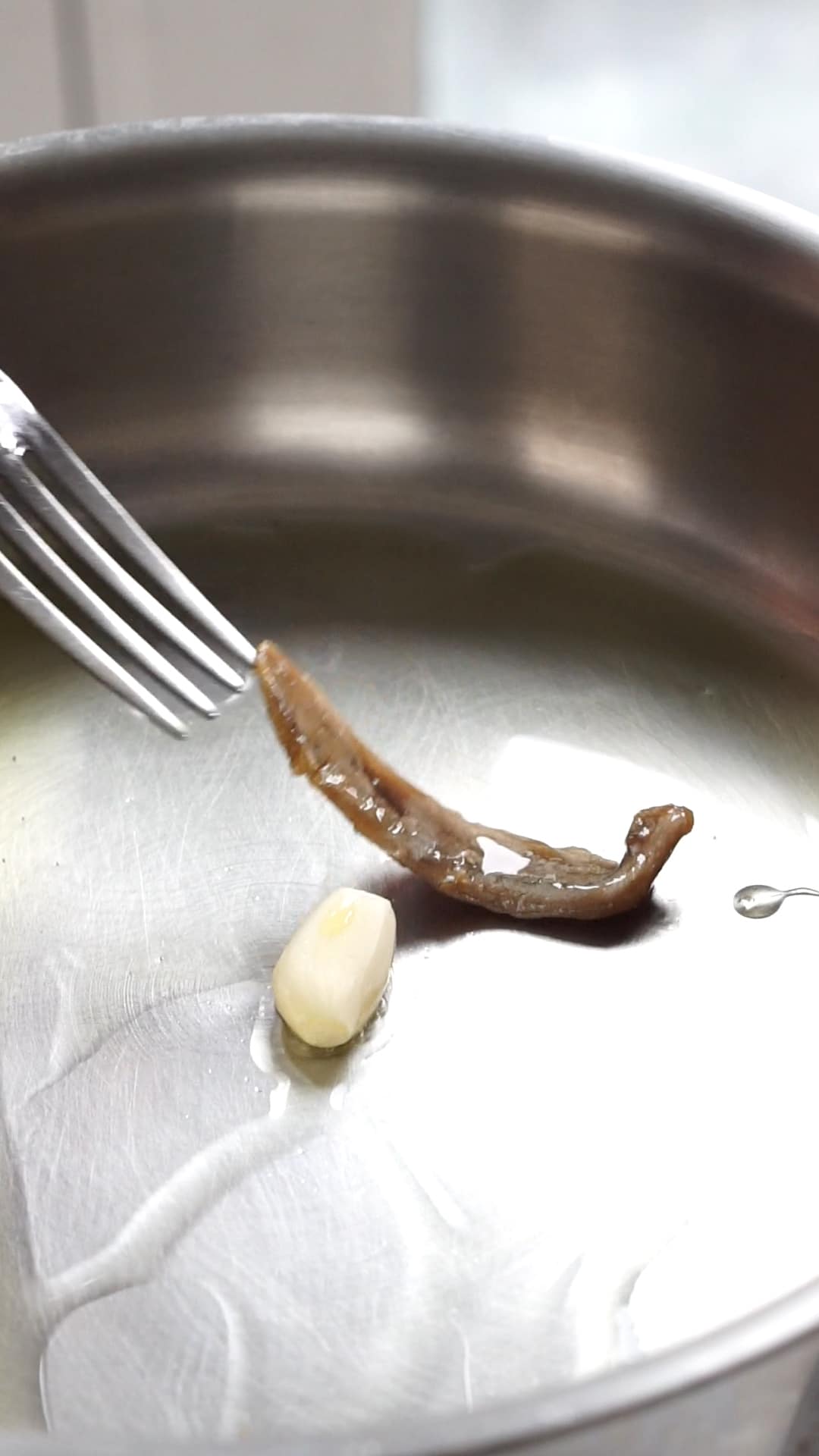 Cavatelli and broccoli process - sauteeing olive oil, garlic and anchovies