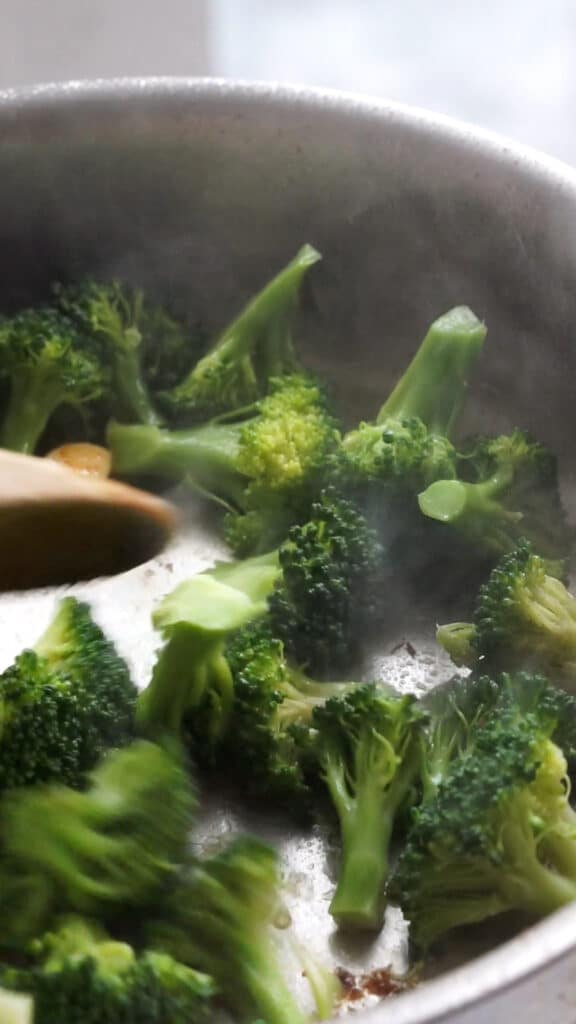 Cavatelli and broccoli process - sauteeing broccoli in a pan