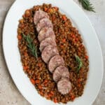 Cotechino and lentils in an oval platter
