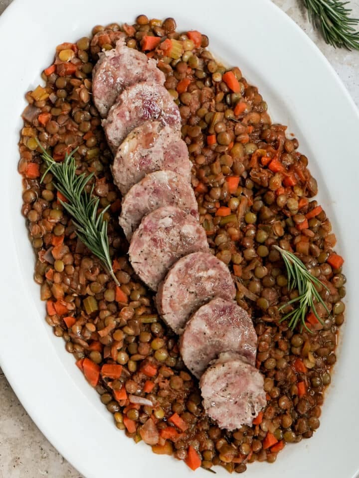 Cotechino and lentils in an oval platter