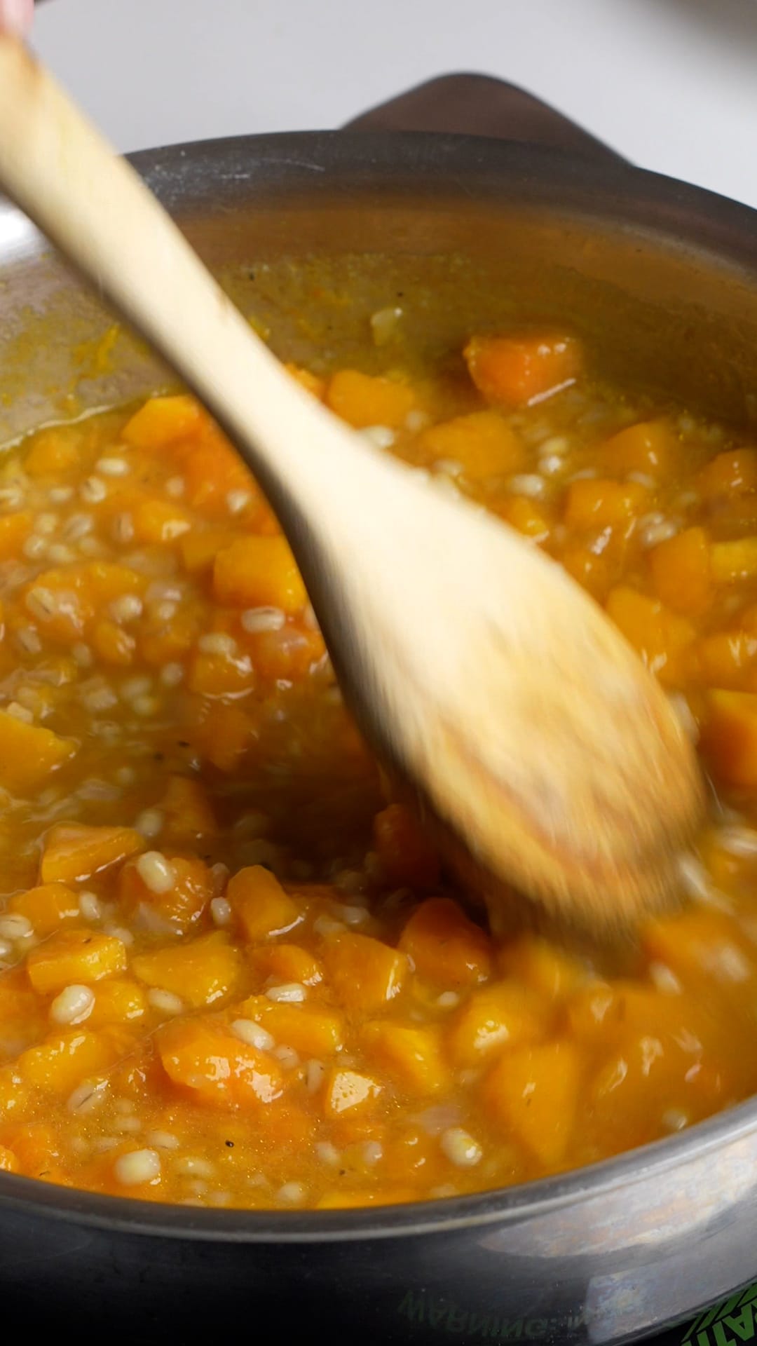 Step by step photos on how to make vegan barley soup - cook the barley until tender