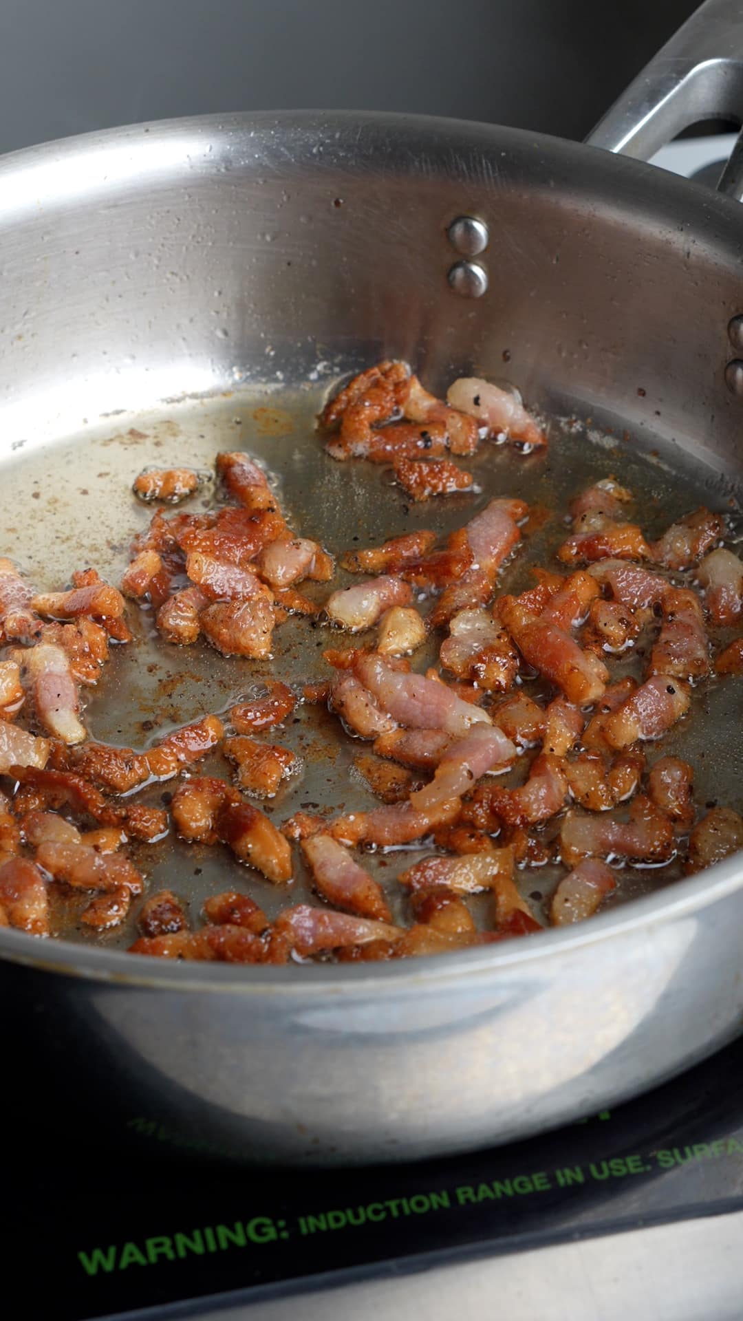 Step by step process on how to make butternut squash-stuffed shells (step 2 - cook the guanciale)