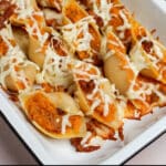 Butternut squash-stuffed shells in a baking dish