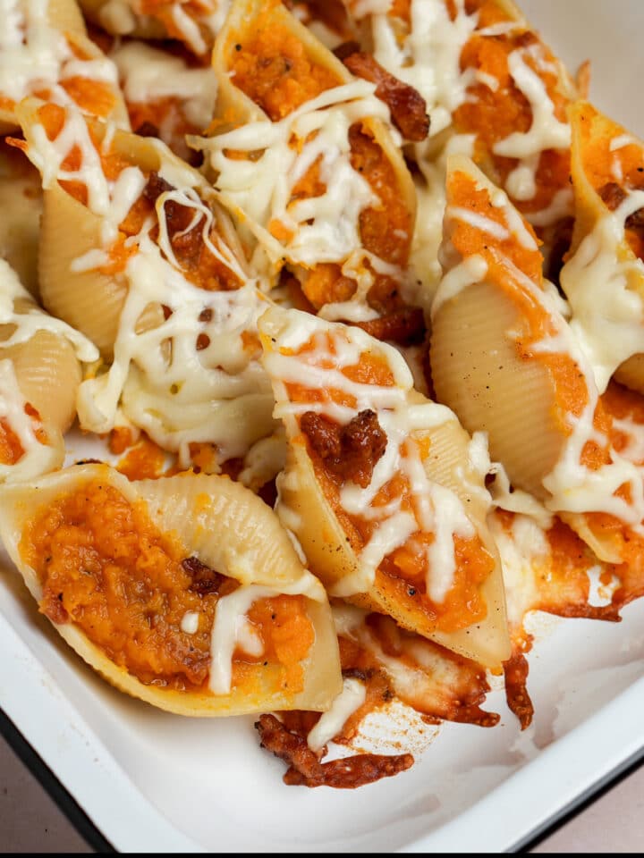 Butternut squash-stuffed shells in a baking dish