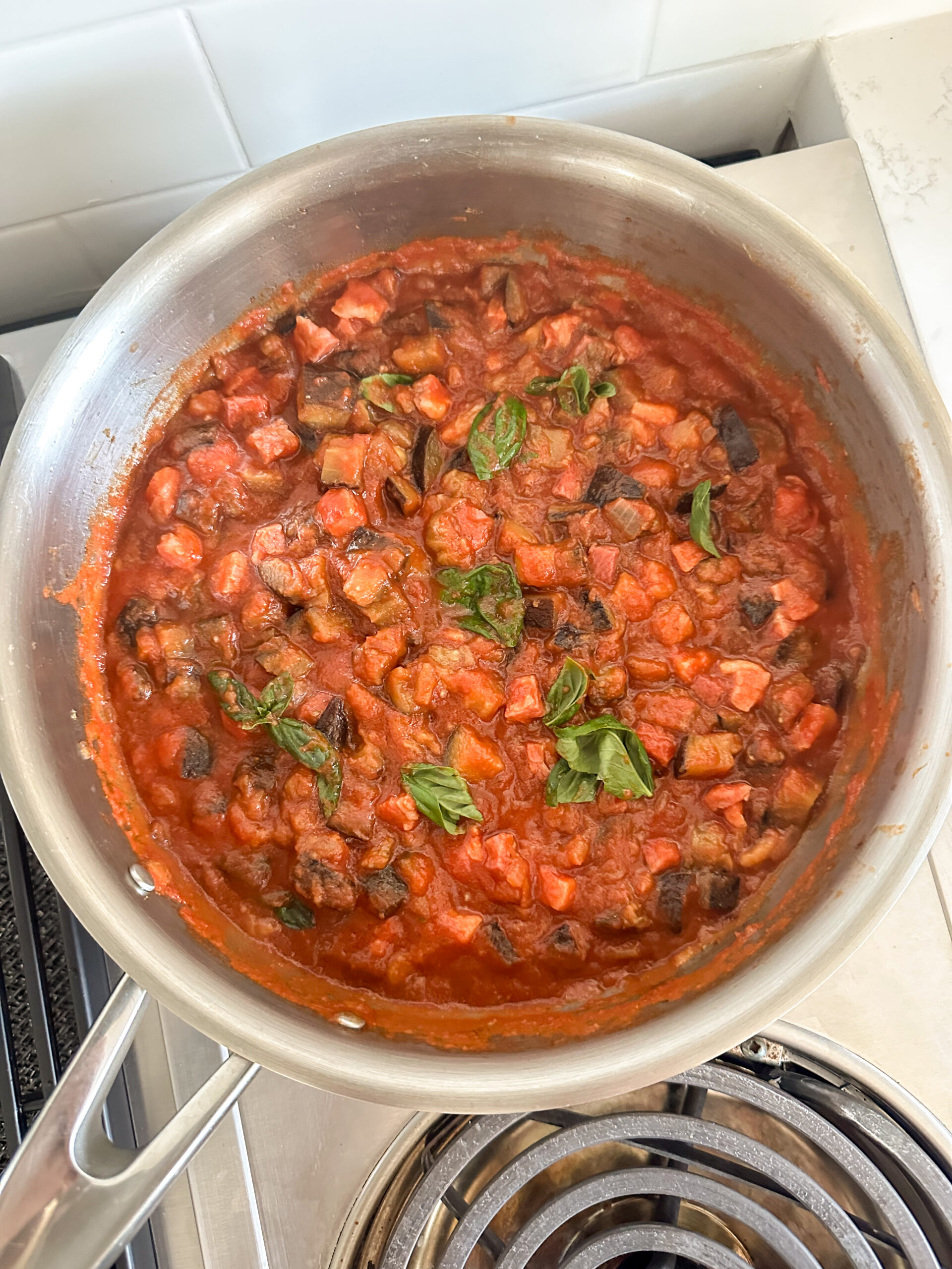 eggplant and and tomato pasta sauce in a pan before ricotta gets added